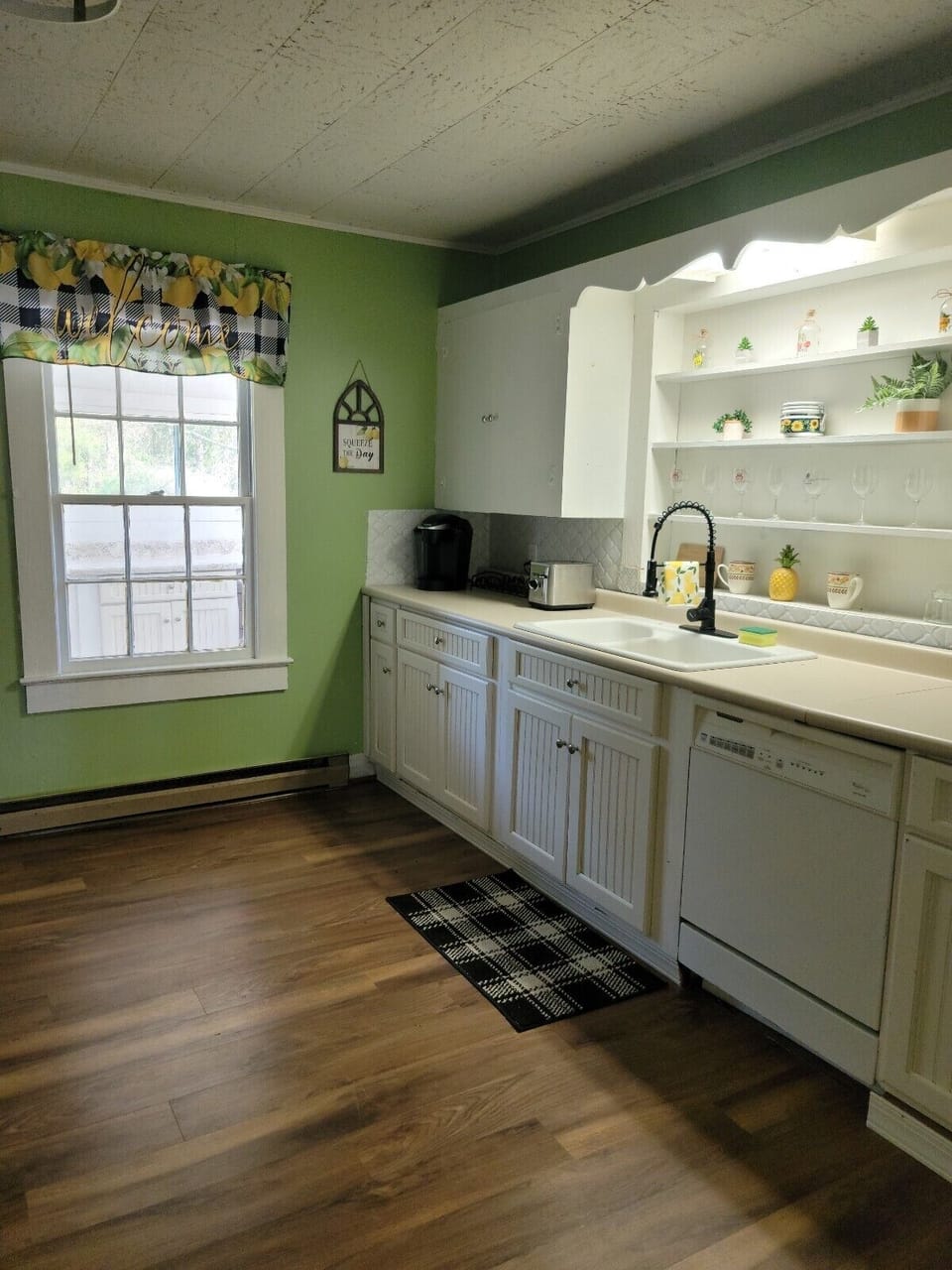 A large spacious kitchen with plenty of room for cooking.