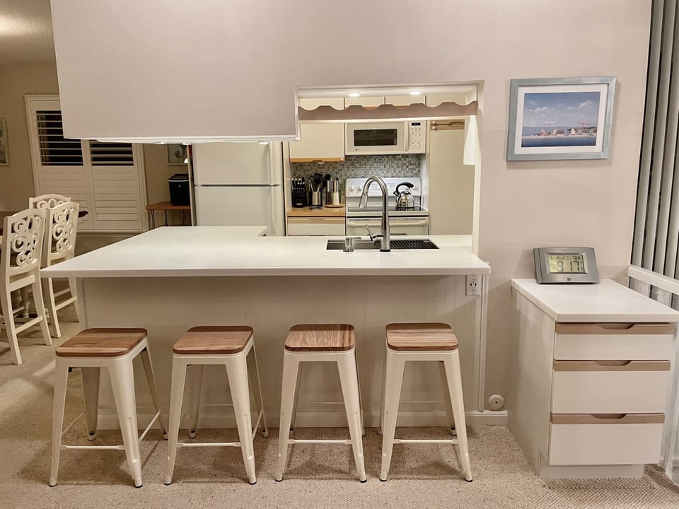 New countertop, workstation sink, touch faucet & dishwasher.
