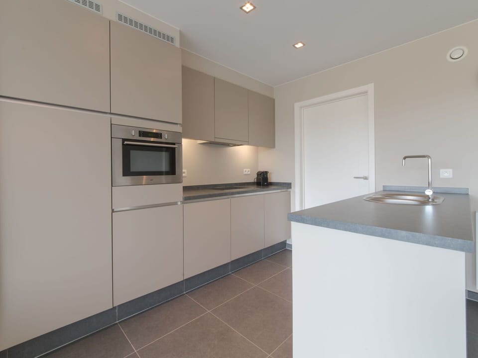 Cabinetry, Countertop, Property, Sink, Building, Kitchen Stove, Tap, Kitchen Appliance, Kitchen, Wood