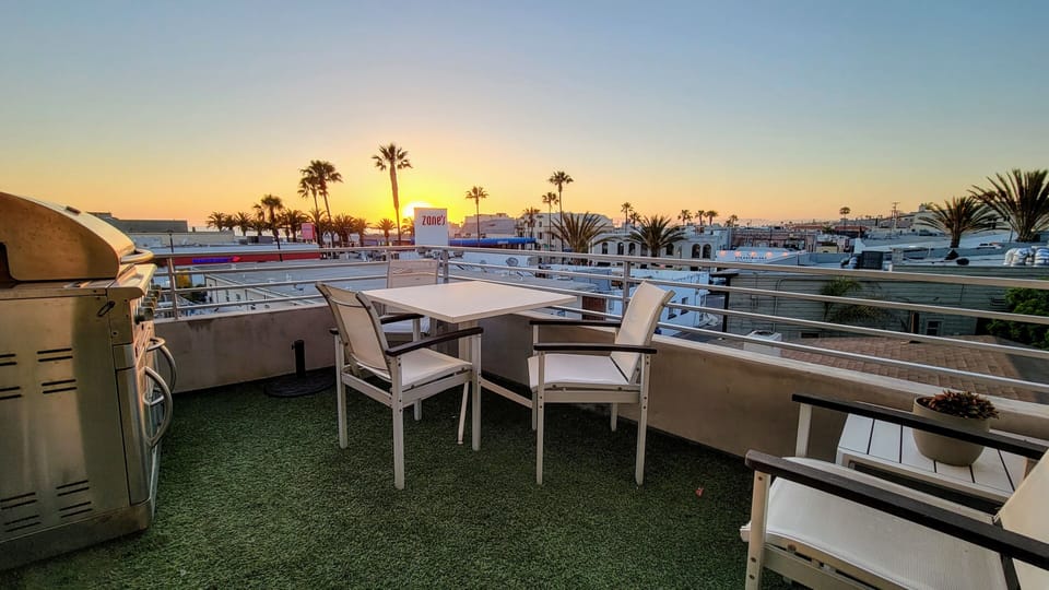 Beautiful sunsets on this balcony off the Living area with a natural gas BBQ.