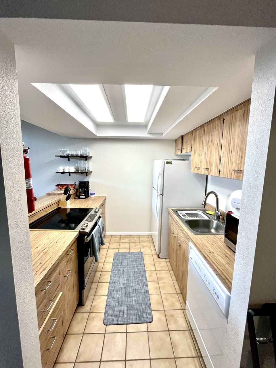 Kitchen stocked with all new pots, pans, kitchen utensils/supplies AND coffee!