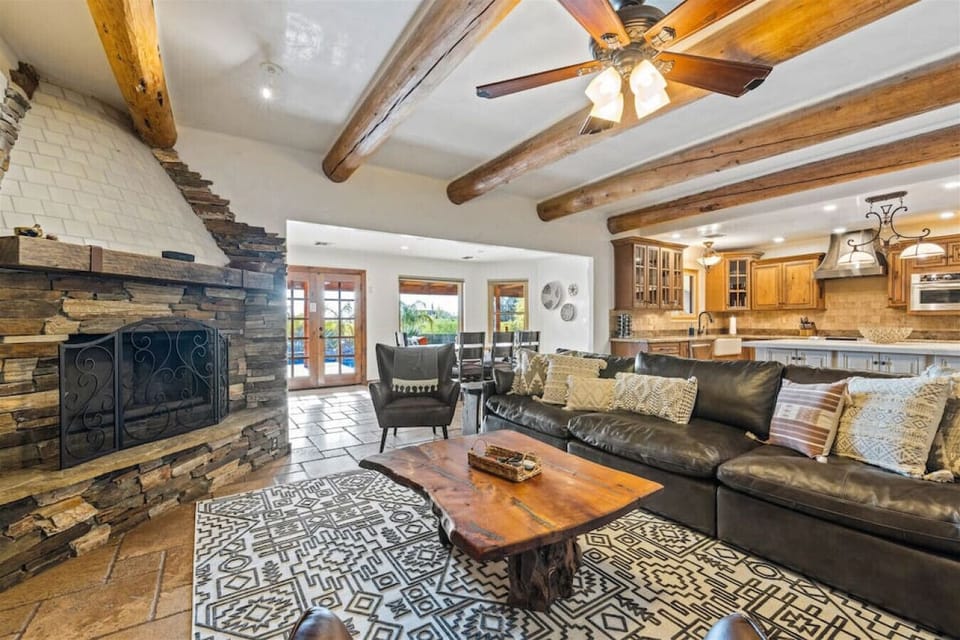 Gather together in the warm and inviting living room, where comfort meets Southwestern charm.