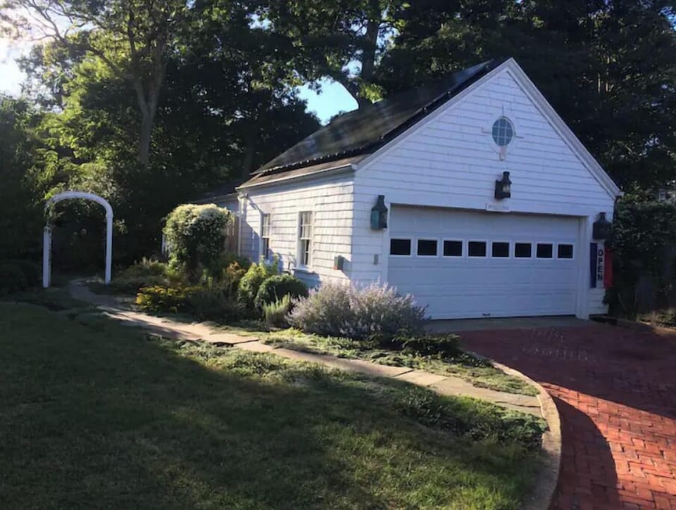 Garage with bikes, beach gear and lawn games