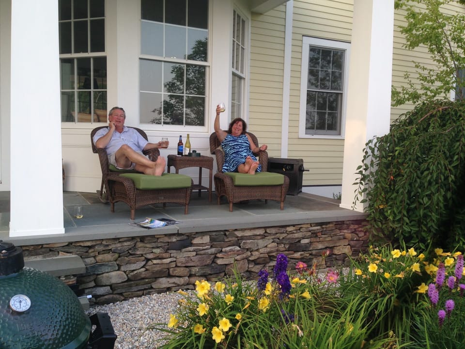 Enjoy beverages on patio overlooking mountain views