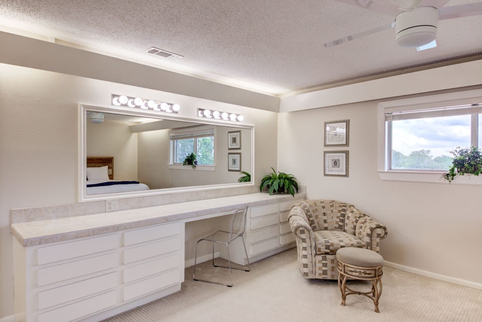 Bedroom 3 make-up area and private access to a full shared bath