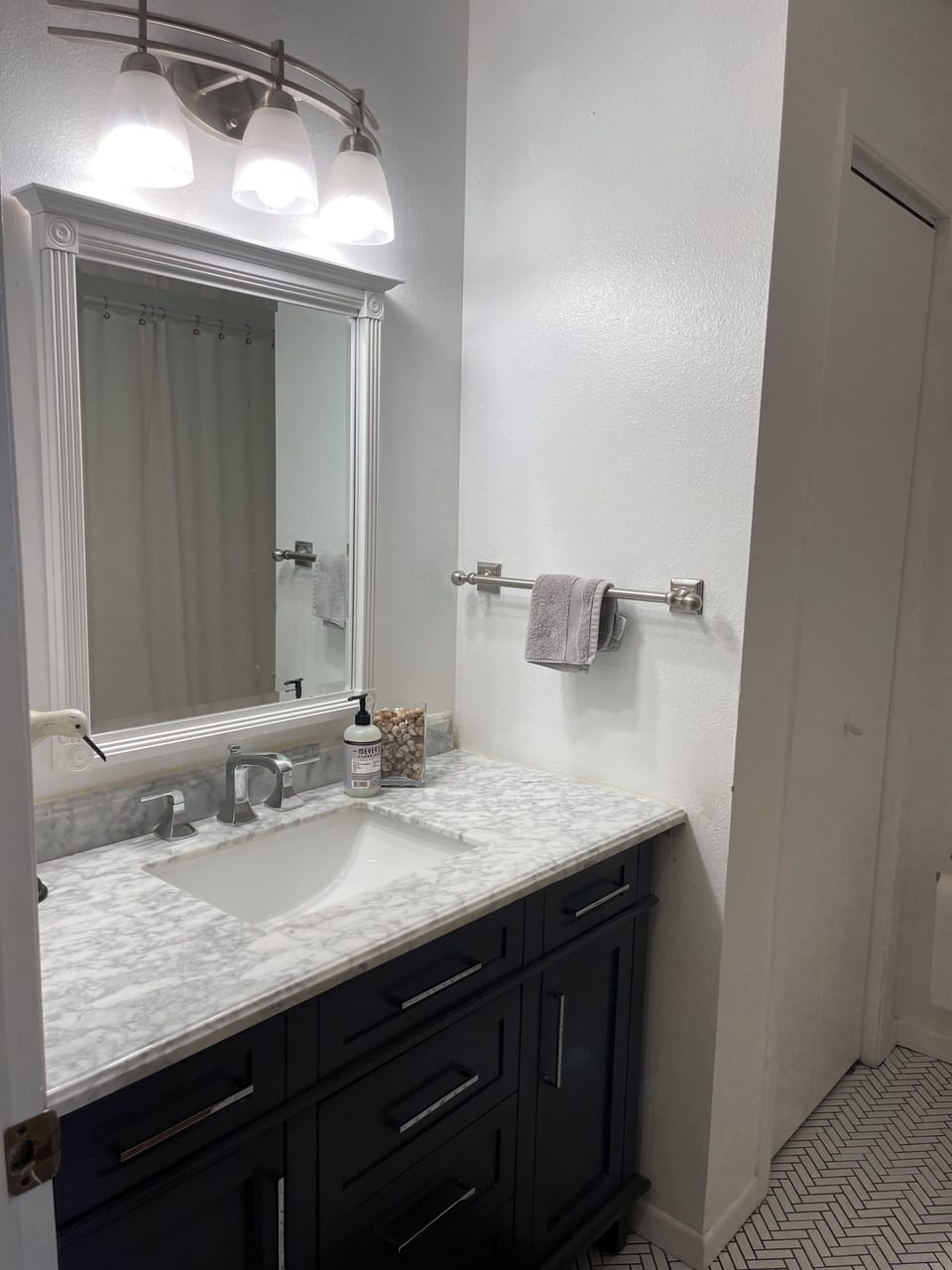Bathroom has easy access to bedrooms 1, 2, and 3 on the main level. 