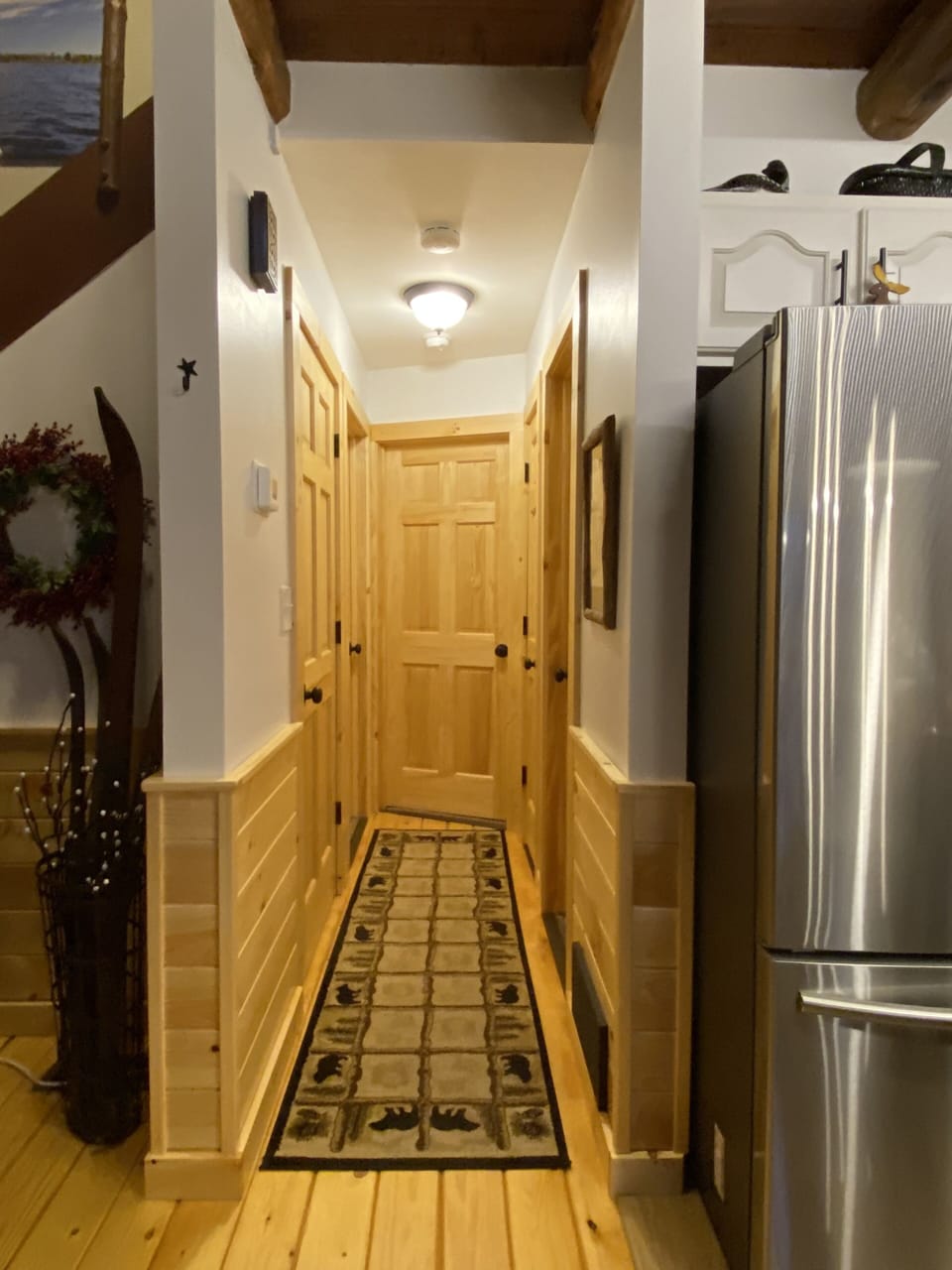 Hallway leading into bathroom and bed room 1 and 2