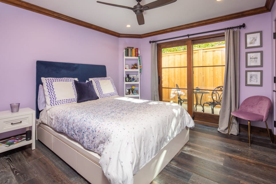Downstairs bedroom with queen bed