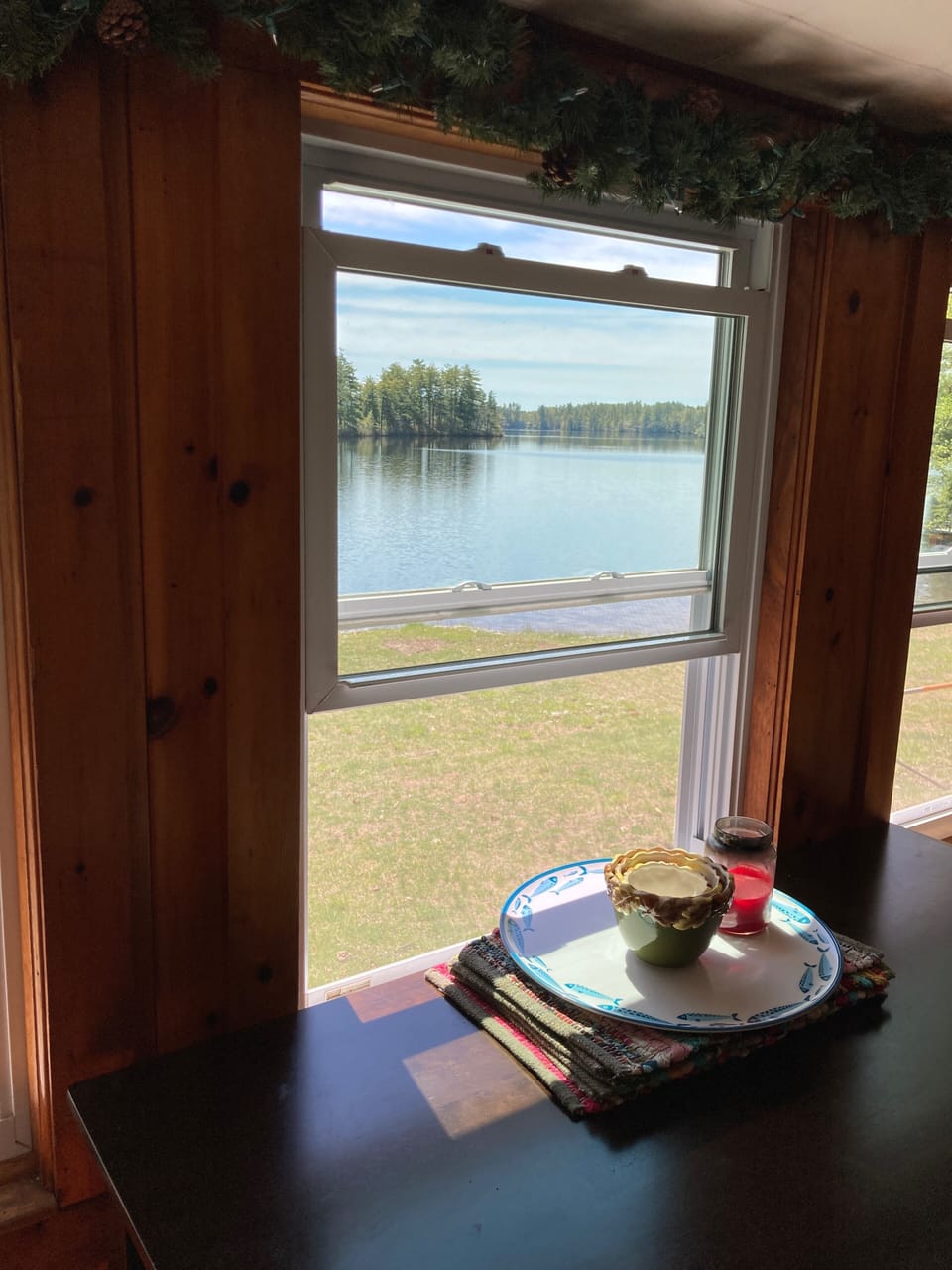 Looking out kitchen window at beautiful lake.