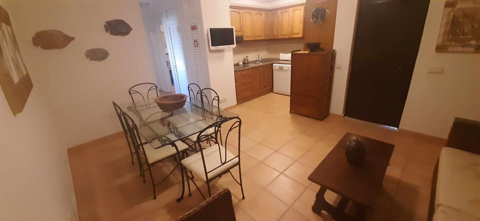 Communal lounge/ TV room,Kitchen or kitchenette,Living room,Dining area