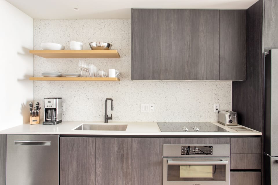 Sleek kitchen features modern appliances.