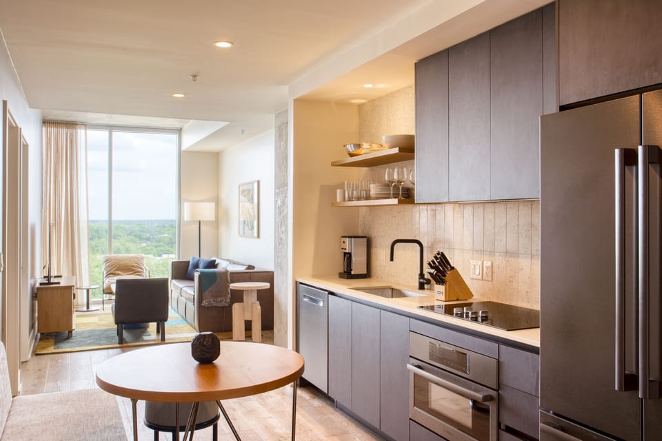 Living area flows into kitchen creating a calming atmosphere.