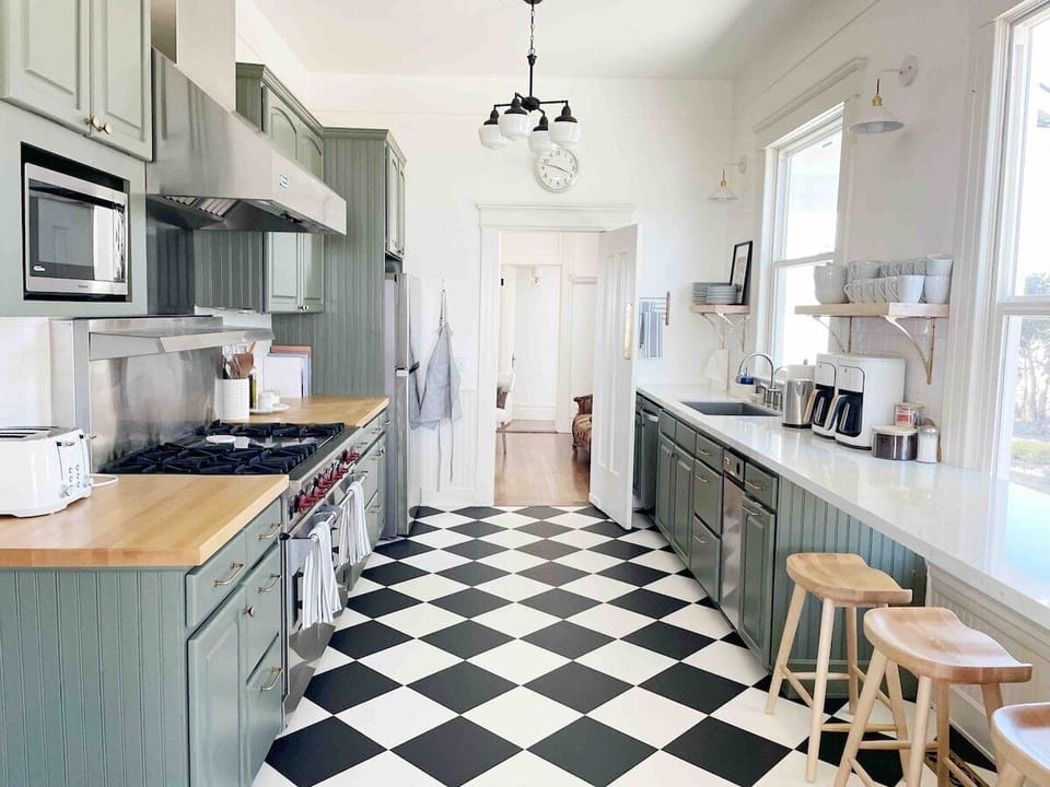 The Edna Estate kitchen is outfitted with everything a cook could want!  We provide all the cooking supplies needed: our cabinets are stocked with all the kitchen basics, even a gourmet Wolfe stove.