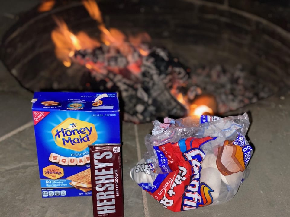 Enjoy yummy s'mores at the firepit on the beach!