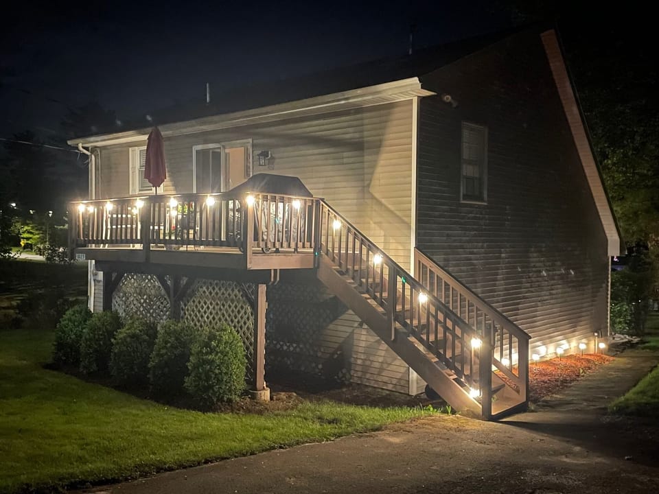 Guest house at night, lit up for your safety