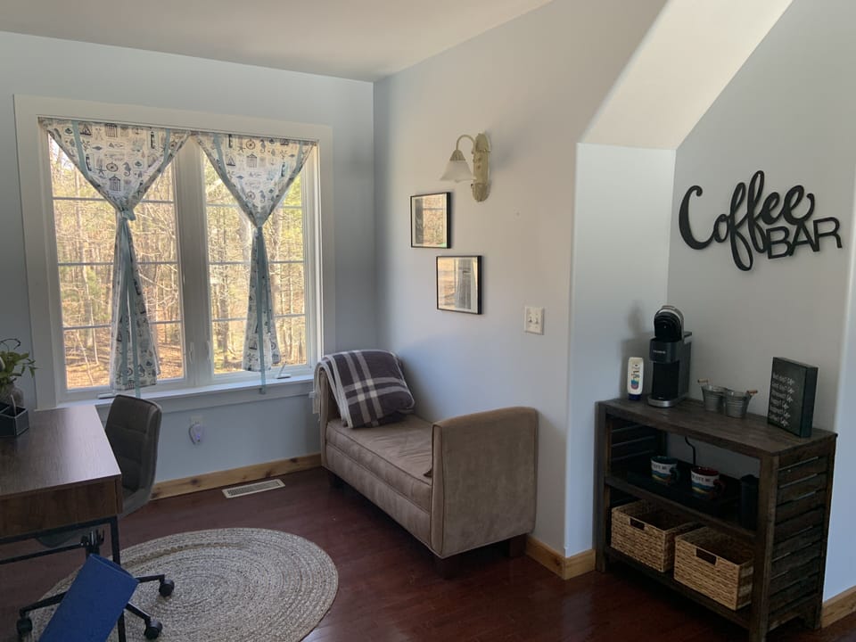 Master bedroom desk area and coffee bar.
