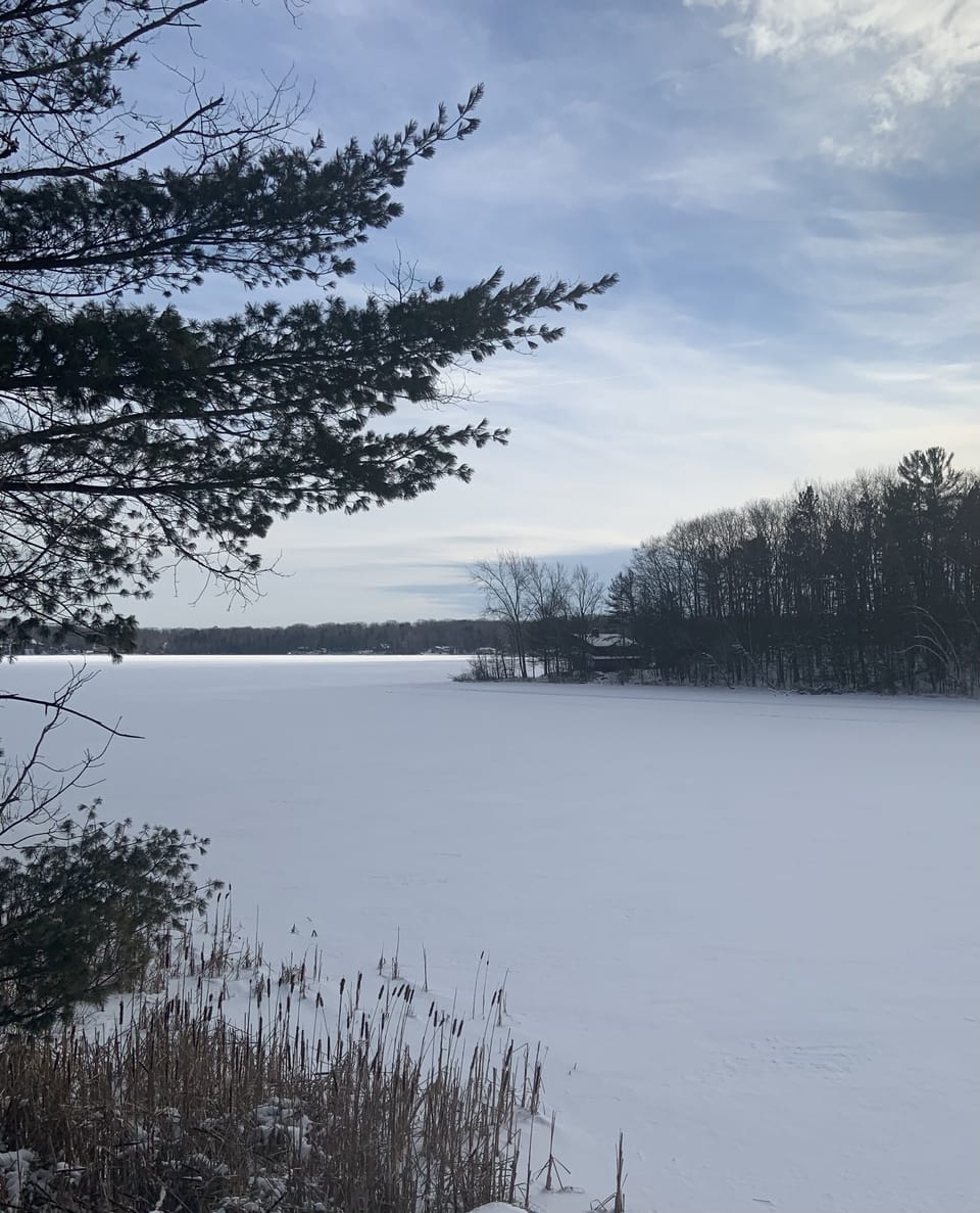 Winter view. Lake freezes to snowmobile across.