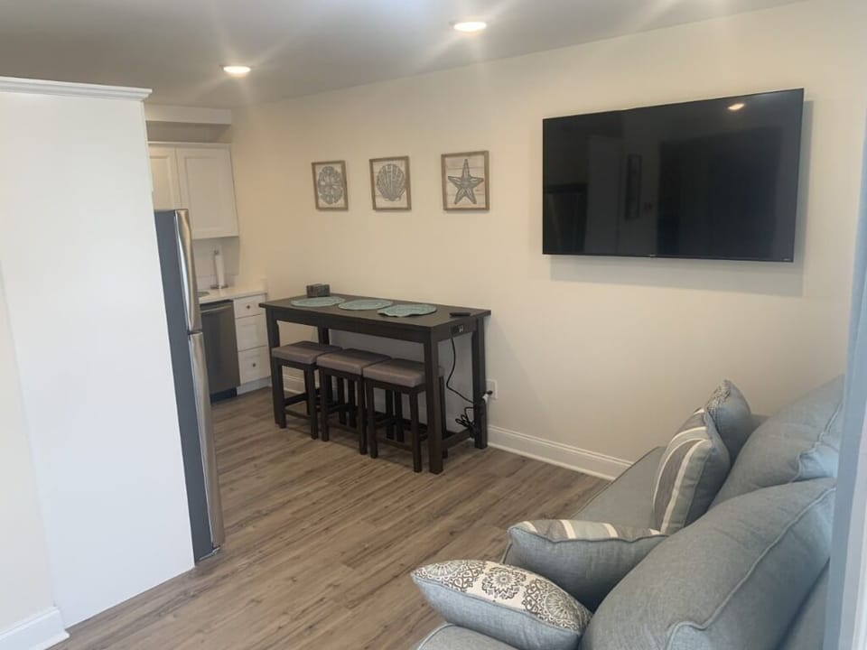Main living area with 65" Smart TV