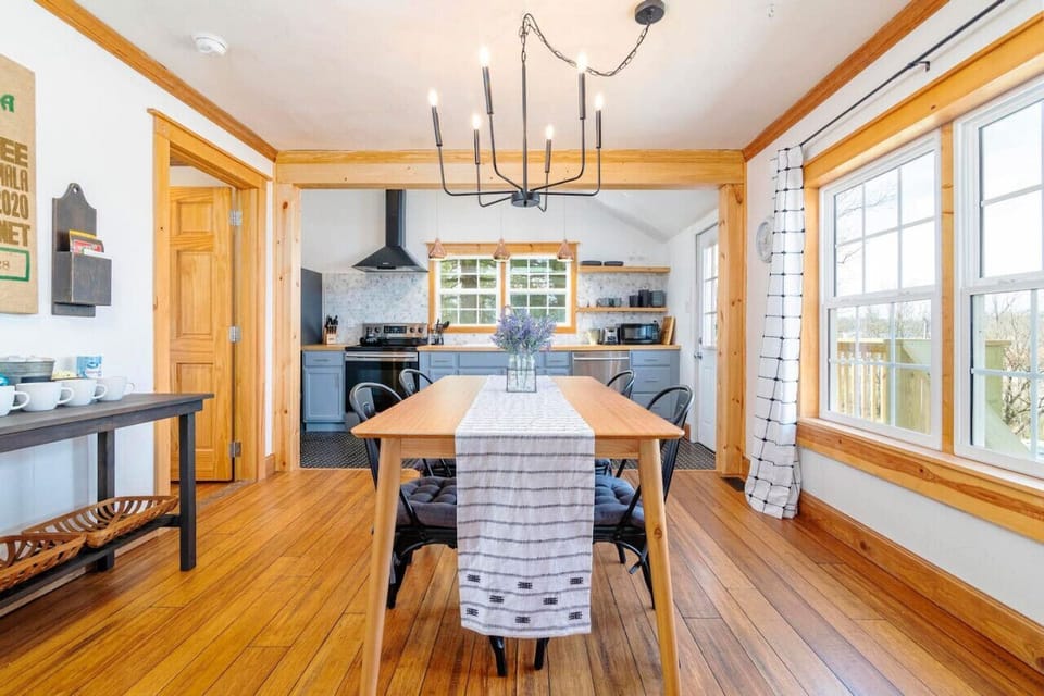 Our dining area offers a warm atmosphere for family dinners or friendly conversations.