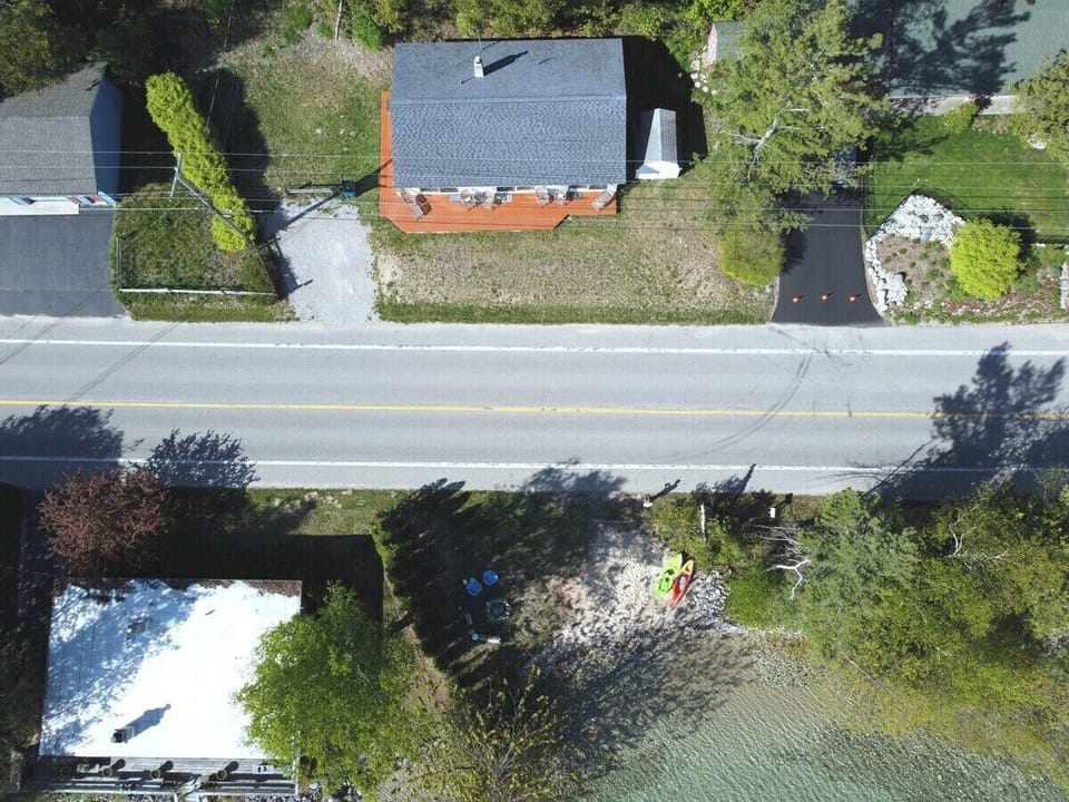 EXTERIOR:  An aerial photo from directly above the private beach.