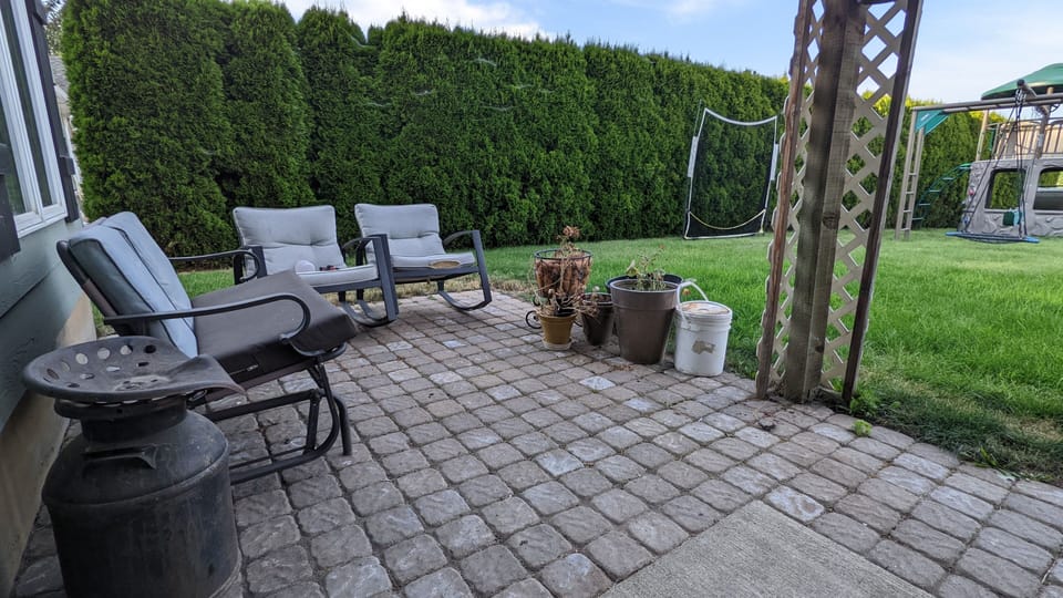 Back patio where you can sit and relax on a summer/fall evening.