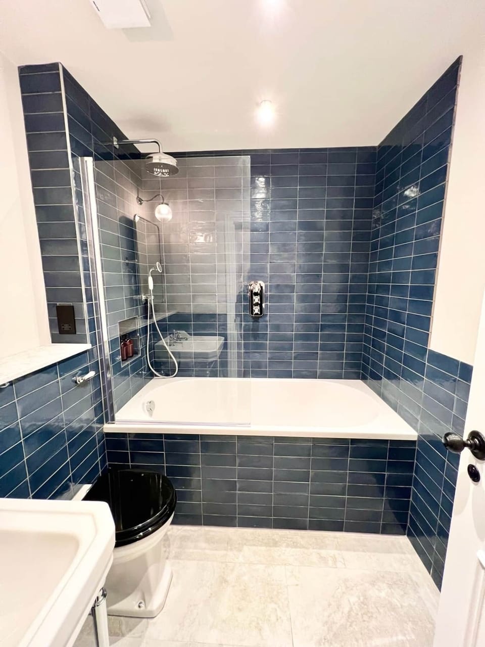 Full Main Bathroom with Bath and Waterfall Shower (1)