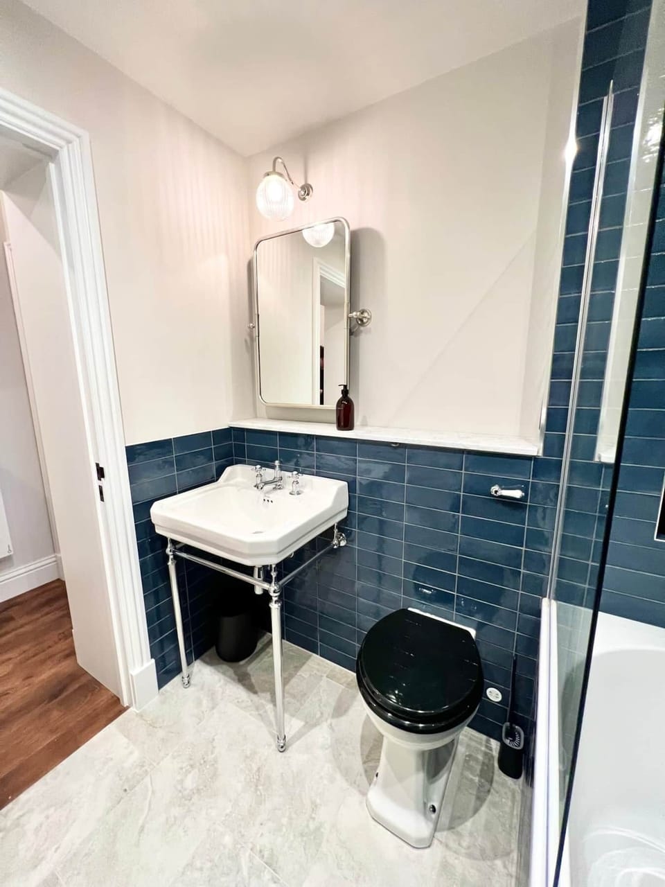 Full Main Bathroom with Bath and Waterfall Shower (2)