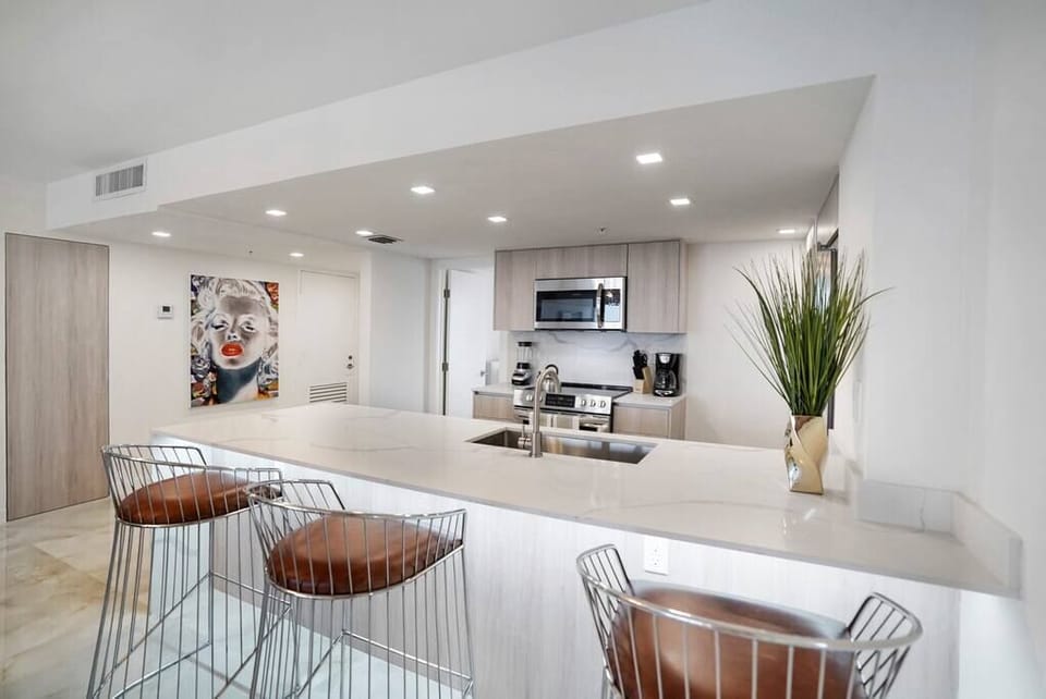 Seating at kitchen counter, small jr. size 4th bedroom off kitchen 