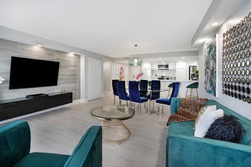 Living room, dining area, washer/dryer, Roku streaming tv, balcony access