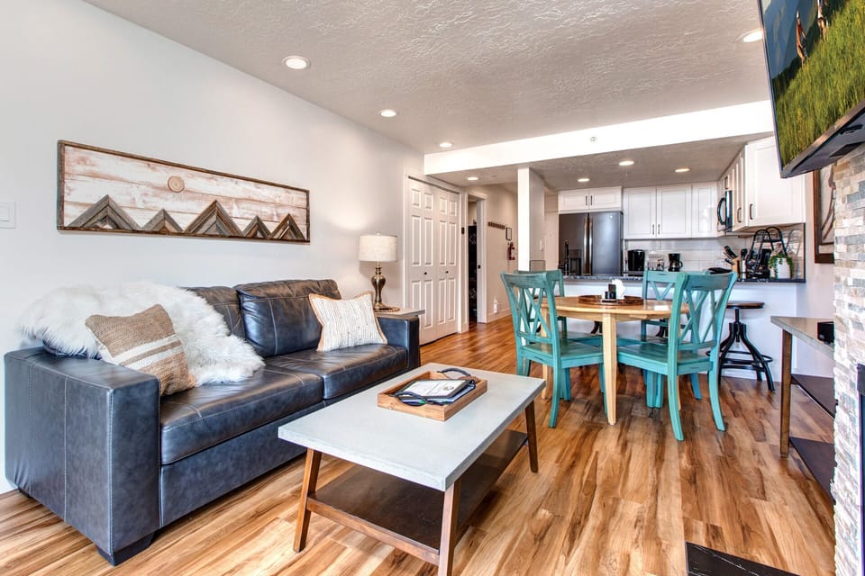 Vacation Rentals in Park City at New Claim 402: Living room with gas fireplace and private balcony