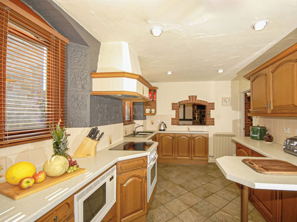 Kitchen area | Trinity Lodge - Burton Ferry Holiday Cottages, Burton, nr Milford Haven