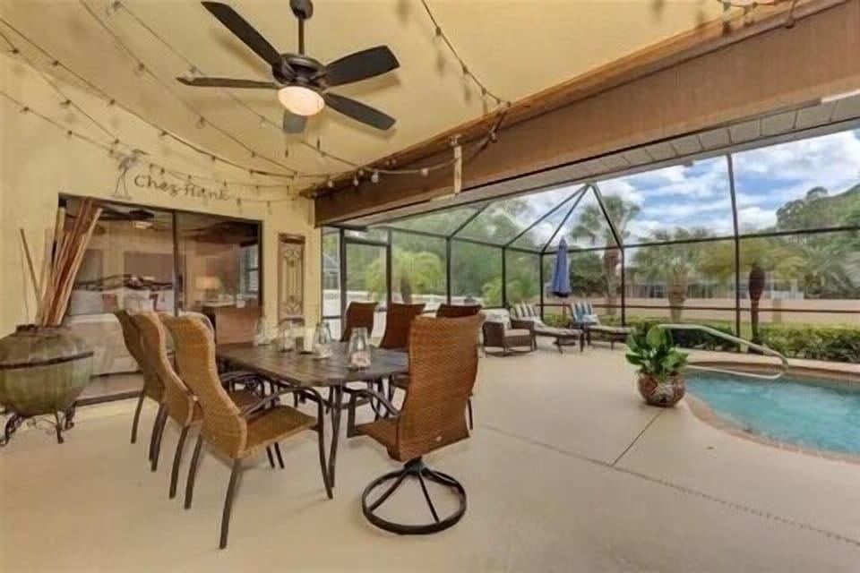 Lanai table seating for eight. Propane grill also available. 