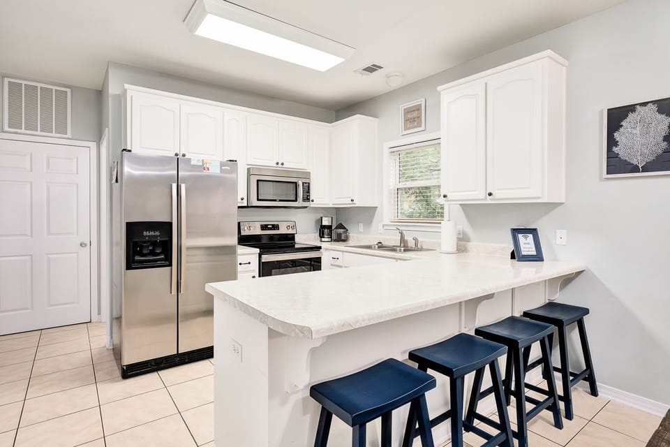 Counter barstools in kitchen area 