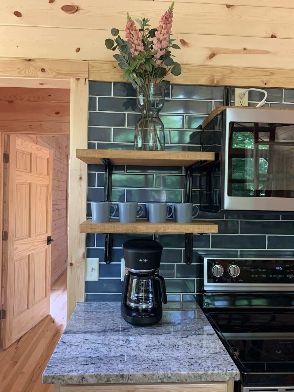 Kitchen: Sleek countertop and stylish decor set the stage for memorable culinary adventures!