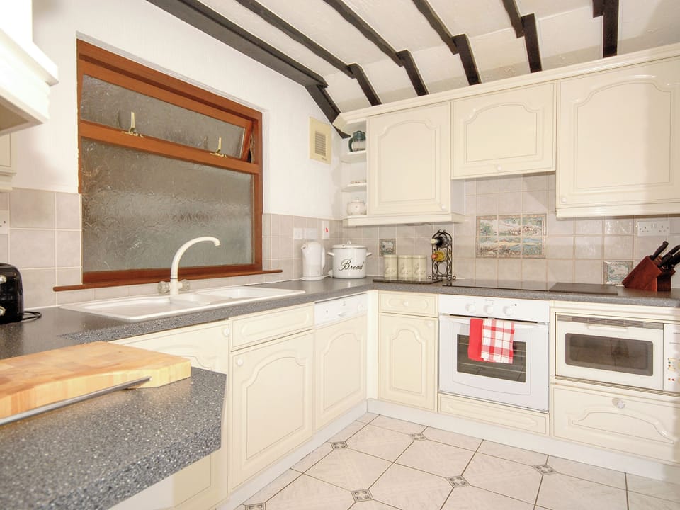 Kitchen area | Trinity Villa - Burton Ferry Holiday Cottages, Burton, nr Milford Haven