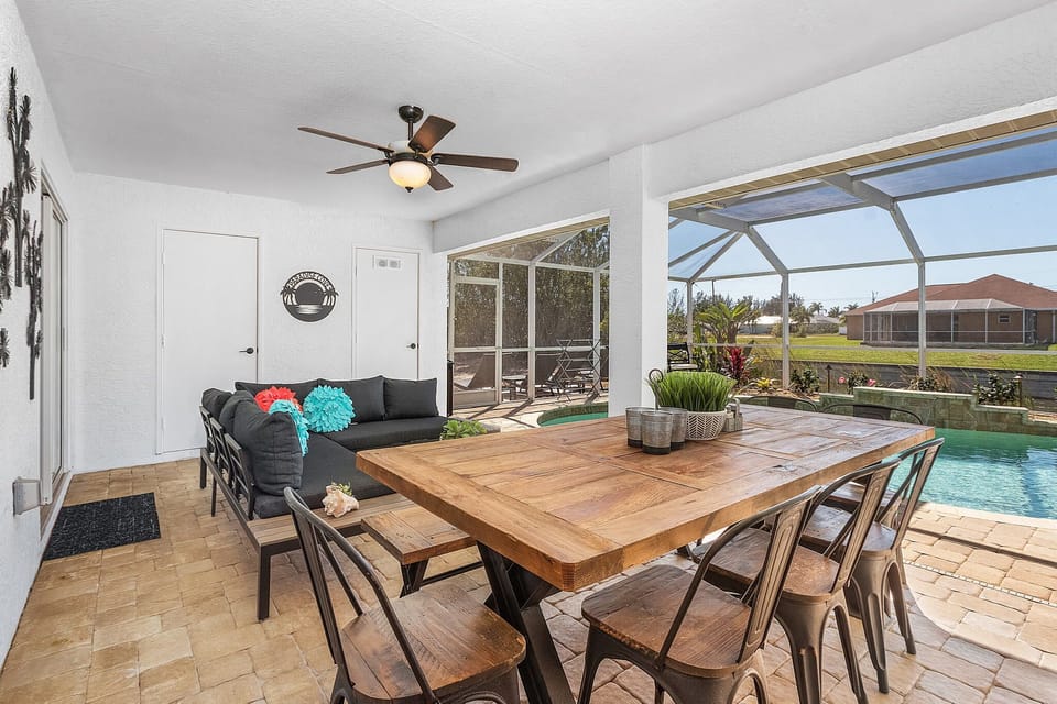 The beautiful, covered lanai allows for poolside dining & relaxation rain or 