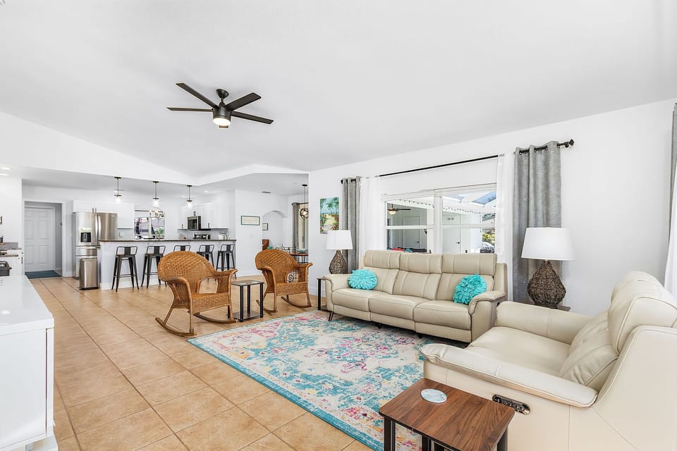 The family room is open to the kitchen & dinette. “Canal Dreams” is on the left.