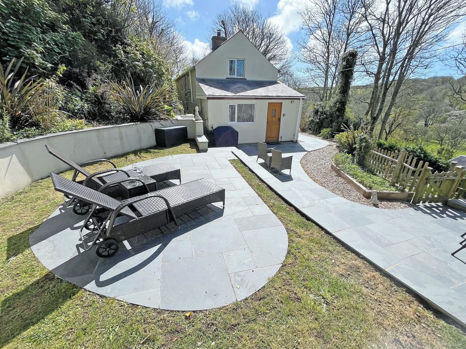 View from upper patio back to cottage | Bridge View Cottage, Middle Mill, nr Solva
