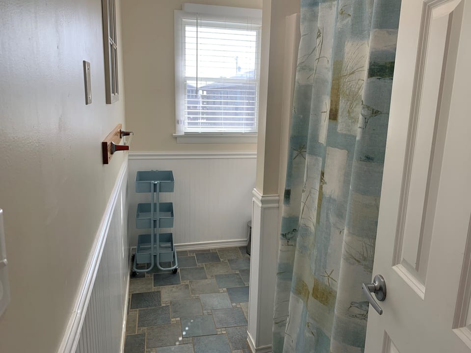 Bathroom (shower and tub combo)