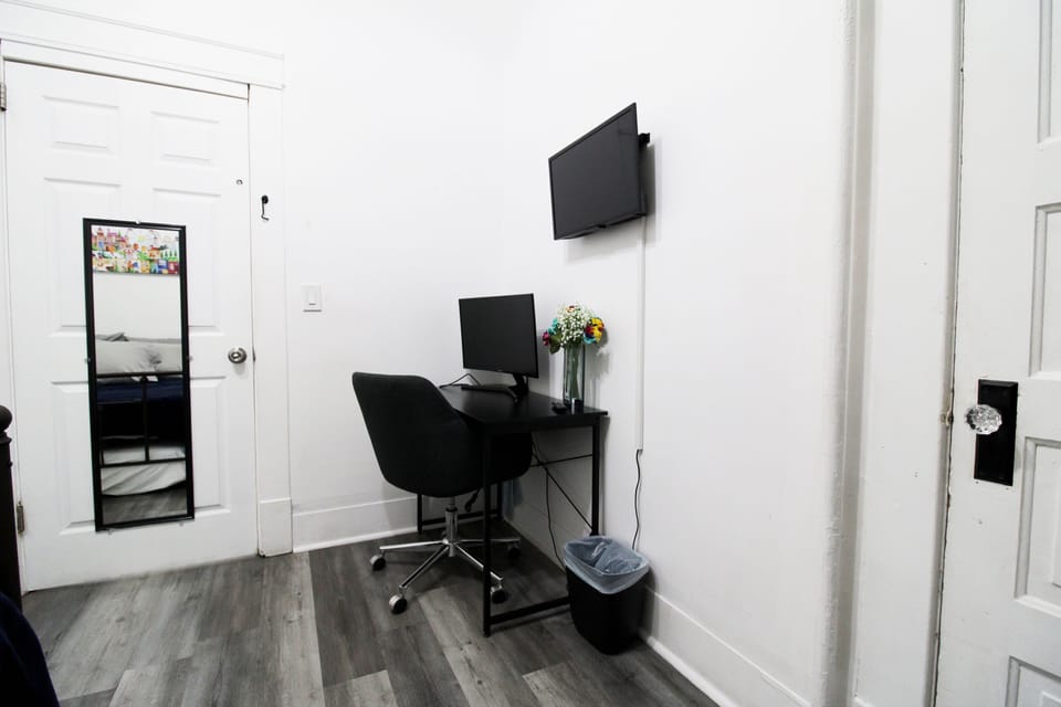 An office space in the middle bedroom.