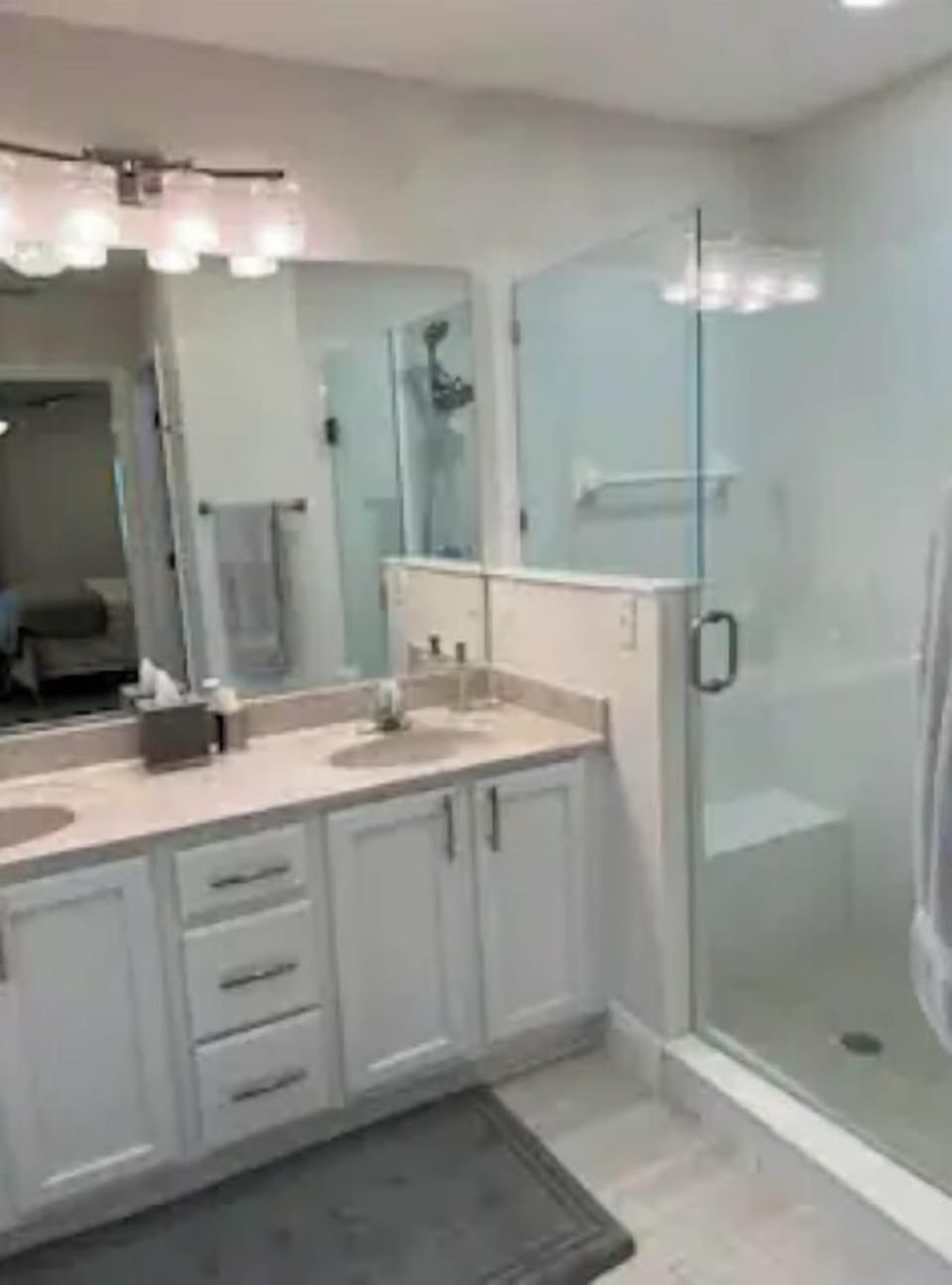 Main Bathroom with shower and separate toilet closet.