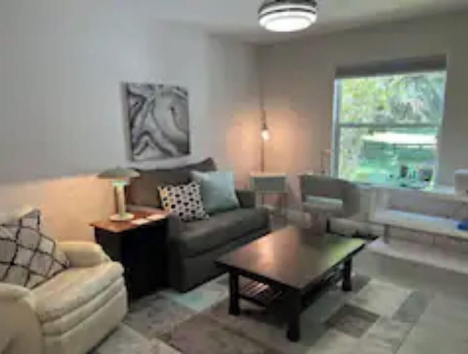 Den w/dedicated desk space and an additional single wall bed.
