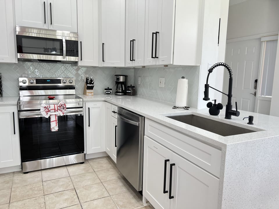 Brand new Kitchen… new appliances, cabinets, Disney dishes and more…