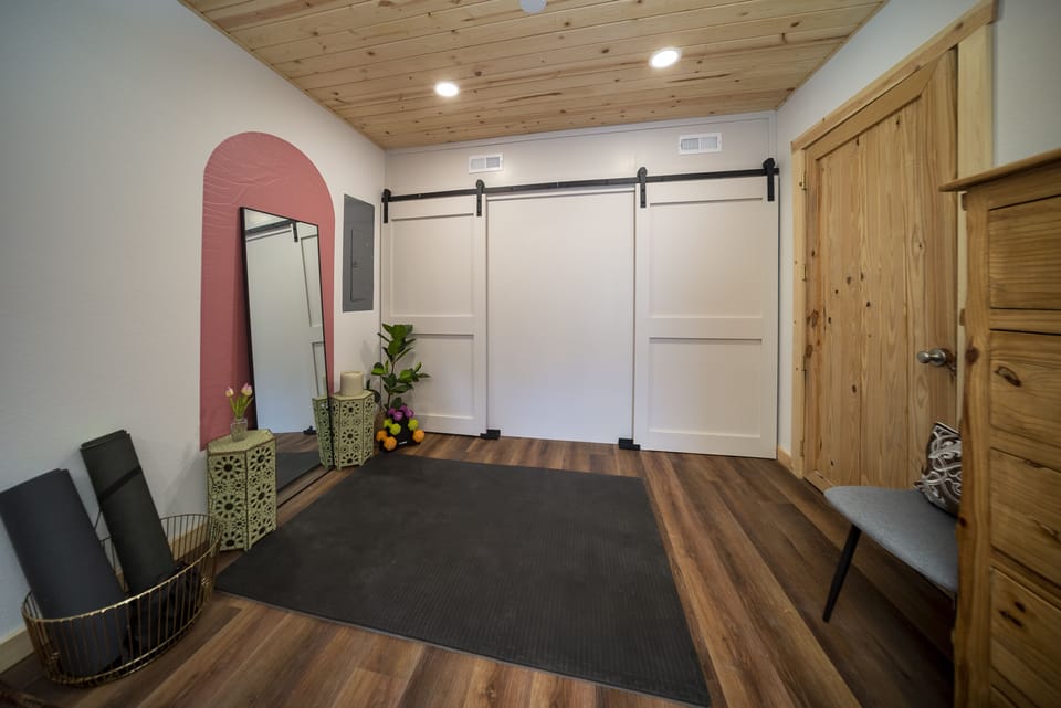 The spacious bunk room boasts plenty of room to practice your yoga