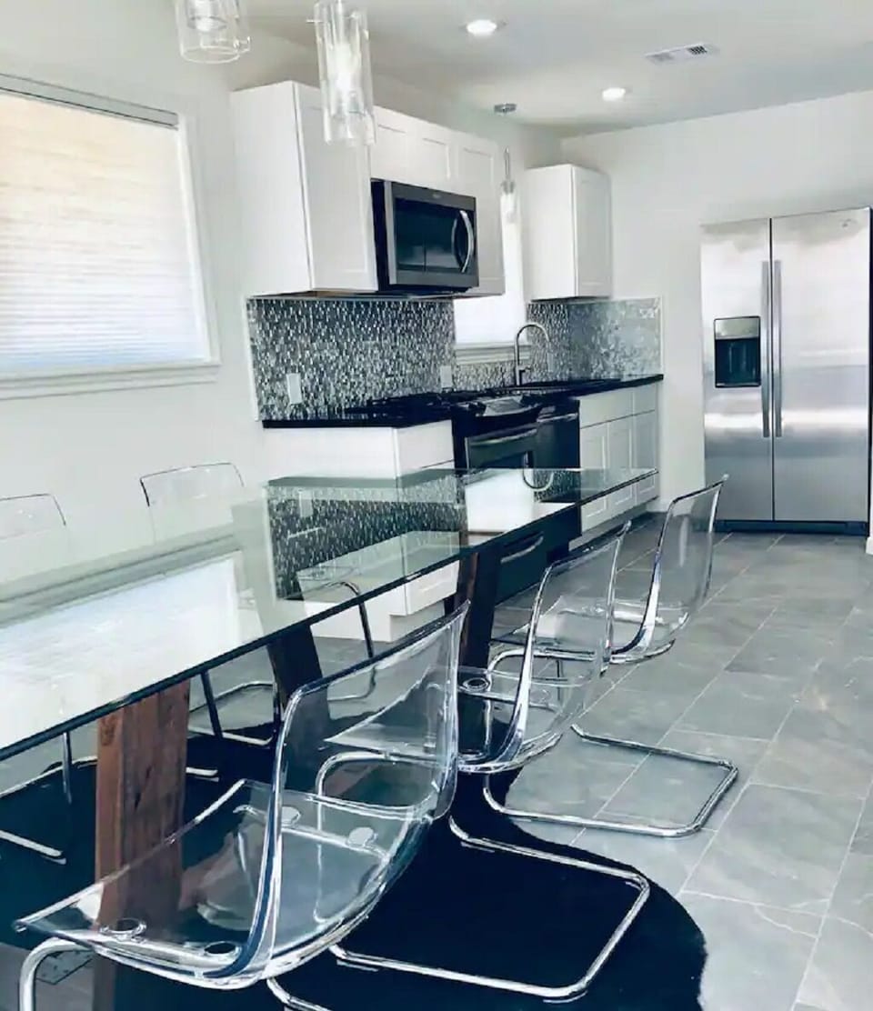 Fully equipped kitchen includes utensils and basics for cooking.