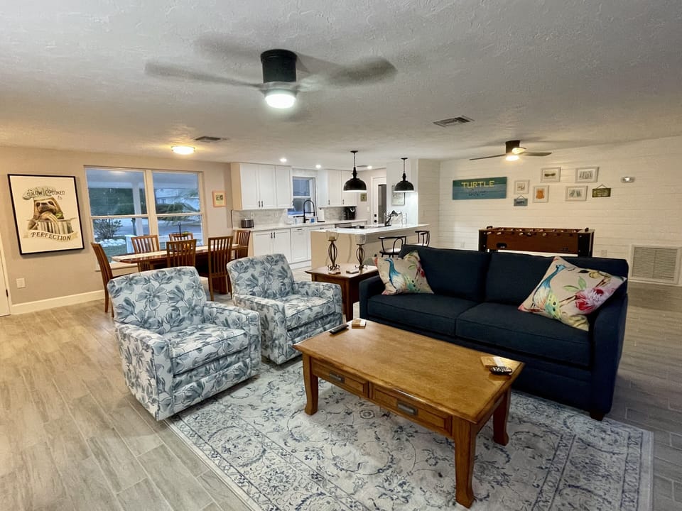 Spacious open floor plan for living room, dining room, kitchen and game area