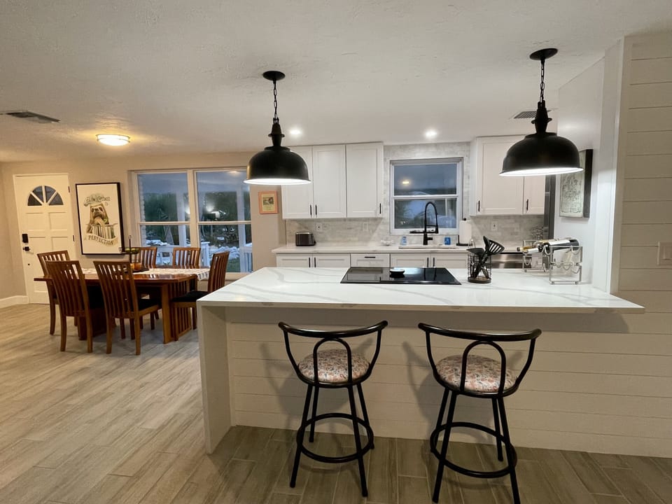 Modern kitchen perfect for gathering while preparing meals