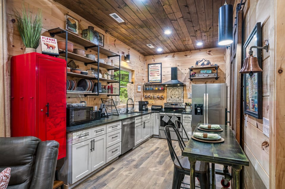 Fully stocked kitchen with roll out/ fold out table 
