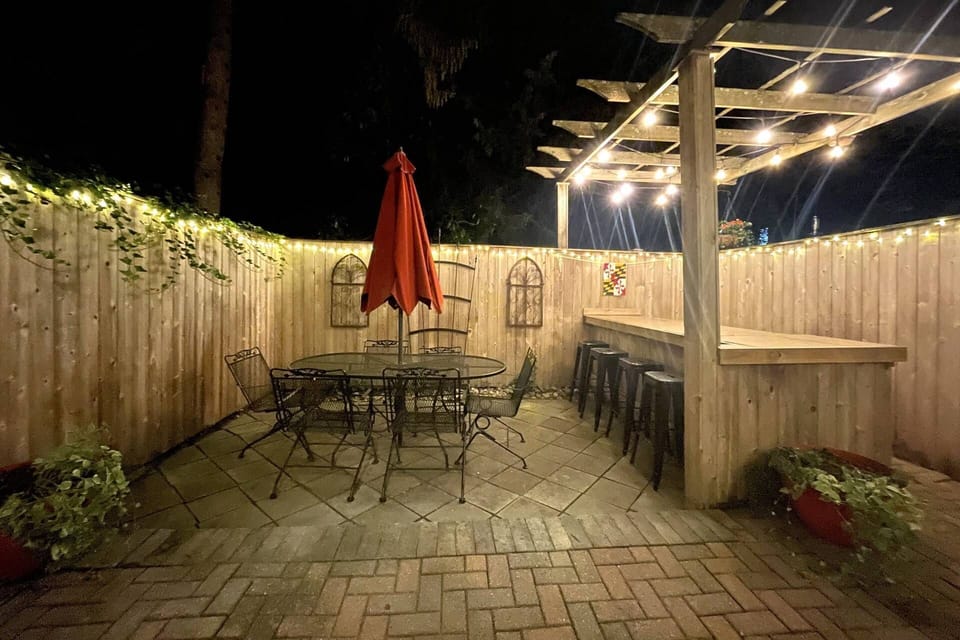 Dine al fresco under the romantic lights in the private patio.