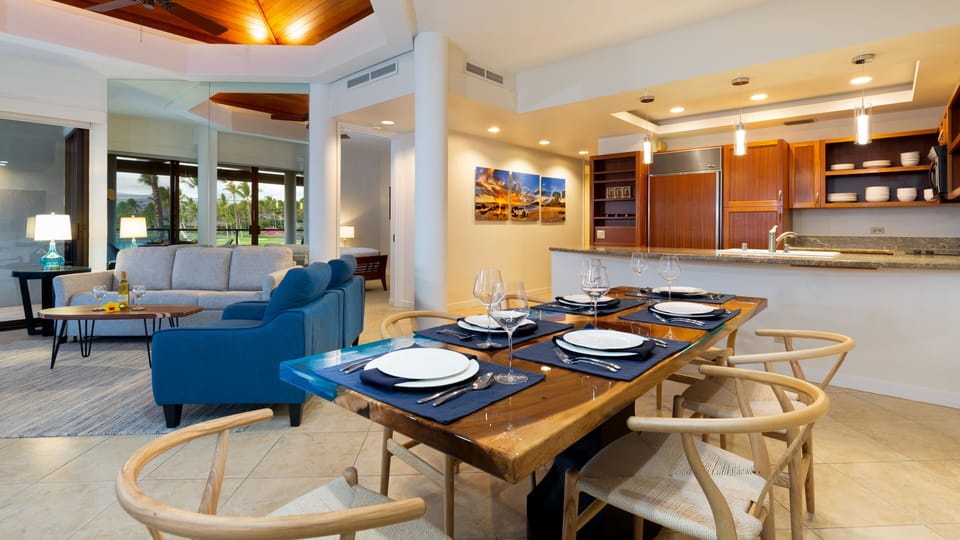 Open kitchen, dining and living room overlooking outdoor lanai